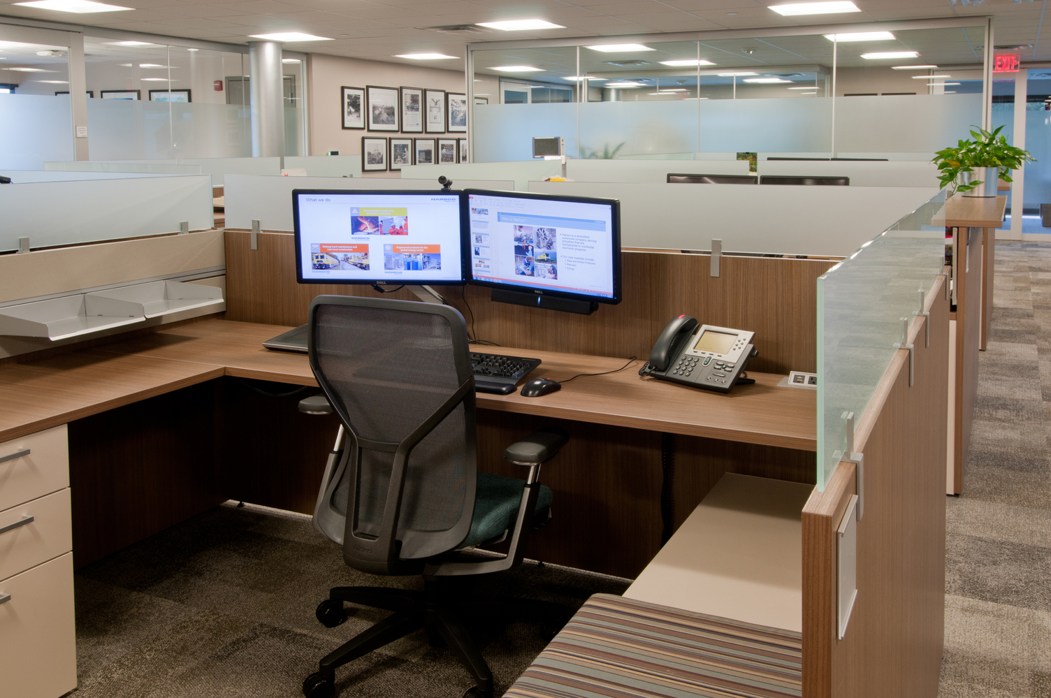 Ergonomic furnishings at Harsco Corporation headquarters, in smaller and more efficient office and workstation sizes